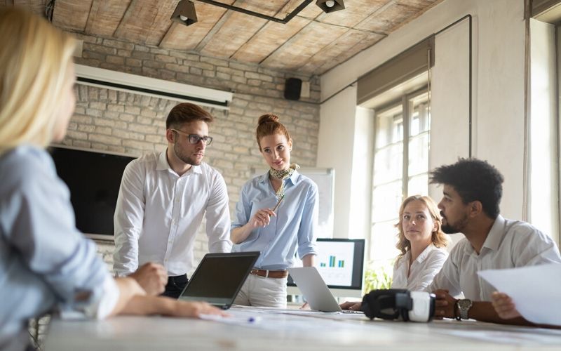 group of multiracial contingent workforce team meeting in a conference room