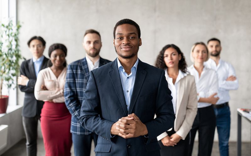 Group of diverse business professionals standing together